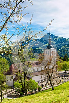 Church and cemetry in Old Town Gruyere, Switzerland