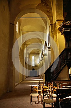 Church chairs in warm light