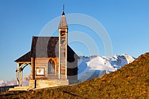 Church or chapel on the mountain and Mount Marmolada