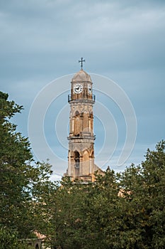 Church clock tower at Ville di Paraso in Corsica photo