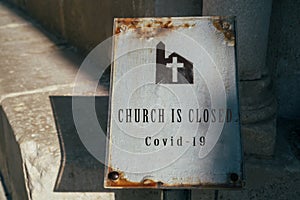 Church is closed sign. Cancellation of church services because of coronavirus outbreak. Church and Religion affected by