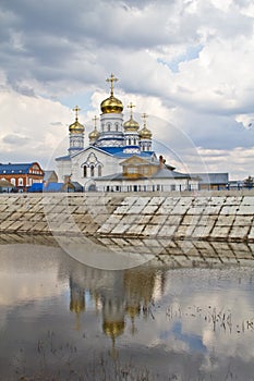 Church and clouds