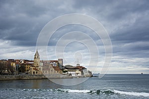 Church, cloudy sky and sea