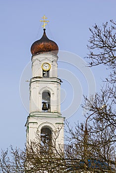 Church with a copper dome and bell and clock