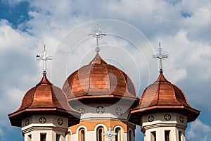 Church copper roof towers with christian crosses above