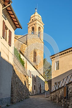 Church of Corpus Domini in the morning streets of Montalcino in Italy