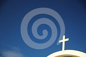 Church cross against the sky