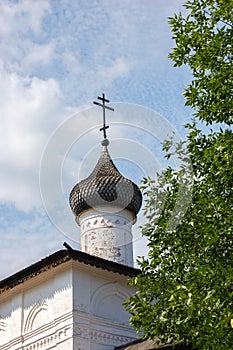 The Church and the cross in the sky. Suzdal, Russia