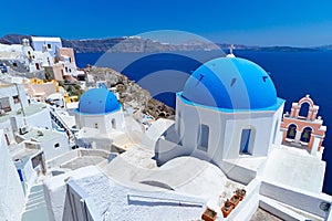 Church Cupolas of Oia town on Santorini island photo