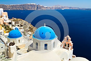 Church Cupolas and the Tower Bell on Santorini photo