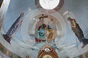 Church dome fresco with religious iconography. Majestic display of biblical figures and Christian symbol