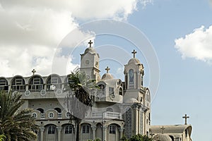 church with domes against the blue sky. Alexandria Egypt photo