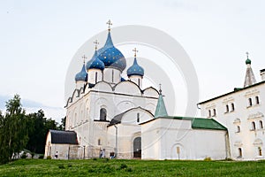 The church with domes under the blue sky