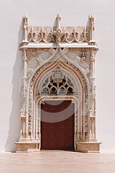 Church door of Sao Joao Batista in Tomar, Portugal. photo
