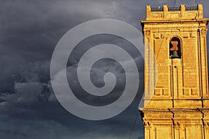 Church facade under threatening sky