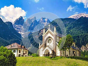 The Church of Falcade in the Dolomites, Italy photo