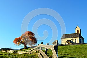 Church and fence in autumn