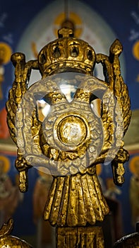 Church figure made of gold wood ornament details