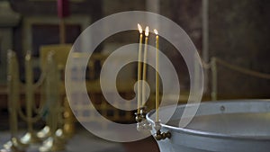 Church font for baptism. Christening ceremony. Interior of the temple.