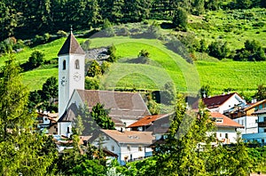 Church at Graun im Vinschgau or Curon Venosta, a town on Lake Reschen in South Tyrol, Italy