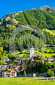 Church at Graun im Vinschgau or Curon Venosta, a town on Lake Reschen in South Tyrol, Italy