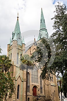 Church with Green Steeples and Red Doors