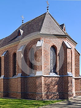 Church in Grevenbroich Wevelnghoven in Germany with blue sky