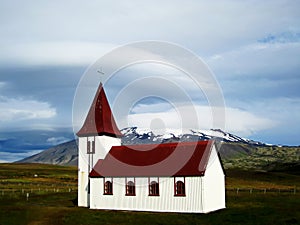 Church in Hellnar with Snaefellsjokull (Iceland)