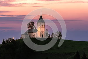 Church on a hill at dawn (St. PrimoÅ¾ and Felicijan on Jamnik