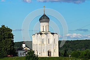 Church of the Intercession of the Holy Virgin on the Nerl River on the bright summer day.