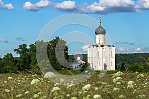 Church of the Intercession of the Holy Virgin on the Nerl River on the bright summer day.