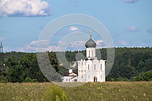 Church of the Intercession of the Holy Virgin on the Nerl River on the bright summer day.