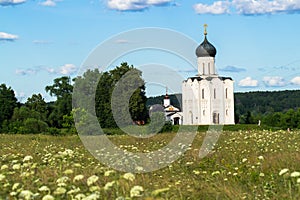 Church of the Intercession of the Holy Virgin on the Nerl River on the bright summer day.