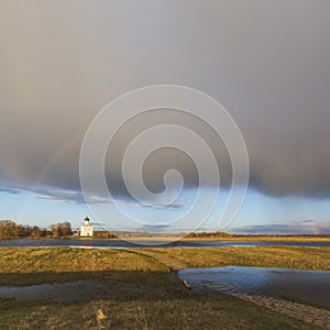 Church of the Intercession on the Nerl. Spring landscape with ra