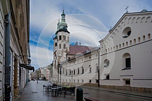 Church in Krakow old town, narrow street, historic center in Krakow, Poland