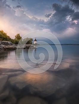 Church by Lake at Sunset