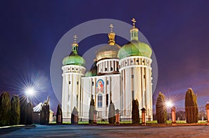 Church in the light of evening lanterns. Holy Protection Church