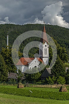 Church in Liptovsky Hradok town in summer color hot day