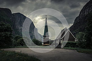 Church in Lysebotn surrounded by mountains in Norway