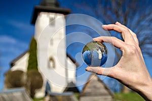 Church in Martincek, Slovakia. Crystal lensball photo