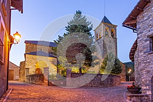 Church of the medieval village of Aisa at night in Aragon pyrenees, Huesca, Spain photo