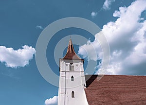 Church of the Mother of God in the Church, the oldest orthodox church in Sighisoara, against a bright blue sky