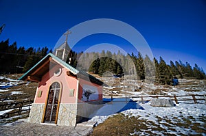 church in the mountains, photo as a background , in the italian european dolomiti alps mountains in vicenza north italy, europe