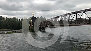 Church in the name of St. Andrew, Sunny June day. The river Vuoksa, Leningrad region