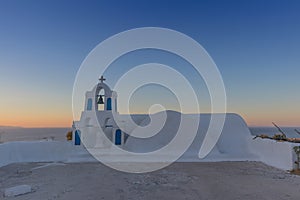 Church in oia, Santorini. Sunset. Greece.