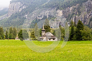 The Church of Our Lady Marienkirche with wood shingle roof, Kandersteg, Switzerland photo