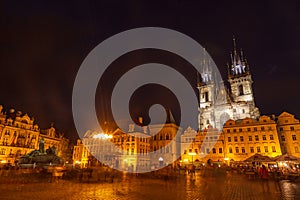 Church of Our Lady Before Tyn and Jan Hus monument in Staromestke Namesti at night Prague Czech Republic