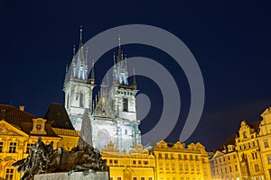 Church of Our Lady Tyn and Jan Hus statue from Old Town Square Staromestska Prague at night.