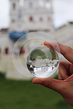 A church perfectly captured in a lens ball in Goa in India