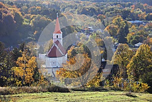 Church in Pernek, Slovakia village with forest